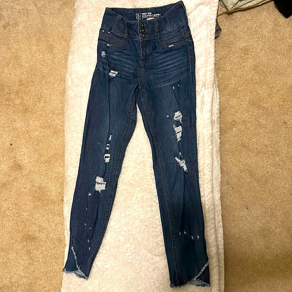 High rise jeans with rips with distressed ankle cuff